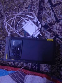 بوكو X6 برو 5G • ٥١٢/١٢ • ملحقات