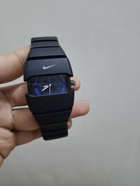 ساعة نايك • قفل فراشة • ظهر براغي