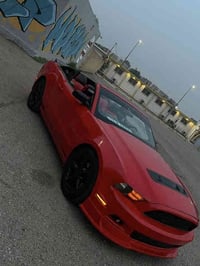 موستنك موديل 2012 محدثه 14 رقم بغداد الجديد هزة وسنوية جدد مكينه  V6 /...