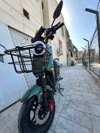 عندي دراجه ار 9 للبيع بطاريه 2026 بطاريه صغار حجم باتري 15 امبير بغداد...