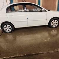 كيا ريو 2014 بدون ضرر هزه جديده محرك 1400 السعر 110 موبايل  0770303644...