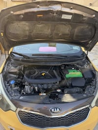 كيا فورتي 2014وارد امريكي رقم بغداد دولي السعر(100ورقه)اوبيه مجال حك ا...