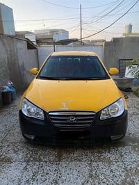 النترا 2009 محرك 2000 السيارة مثل ما موضح بالصورة تكسي رقم بغداد  صدام...