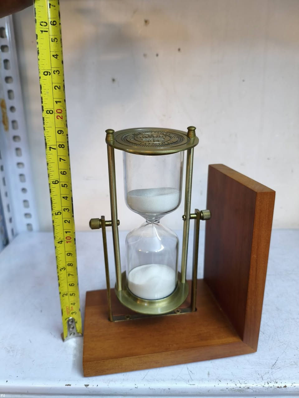 ساعه رمليه نحاس وخشب مكاني بغداد *********** يوجد توصيل
