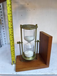 ساعه رمليه نحاس وخشب مكاني بغداد 07739232310 يوجد توصيل