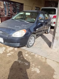 سيارة اكسنت للبيع موديل 2009سيارة جديدة رقم ديالى مشروع وطني تحويل وين...