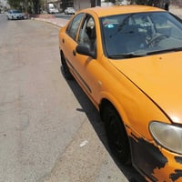 نيسان صني للبيع موديل 11 رقم بغداد دولي بها دفتر بنزين الثانويه 30 سعر...