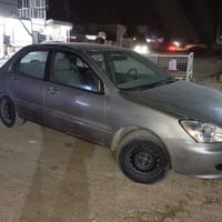 لانسر ٢٠٠٤ مال مزاد اصوليه جاهزه ماناقصها شغلات بسيطه السعر ٣٧ للاستفس...