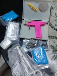 جهاز ثقب الأذن • ملحقات