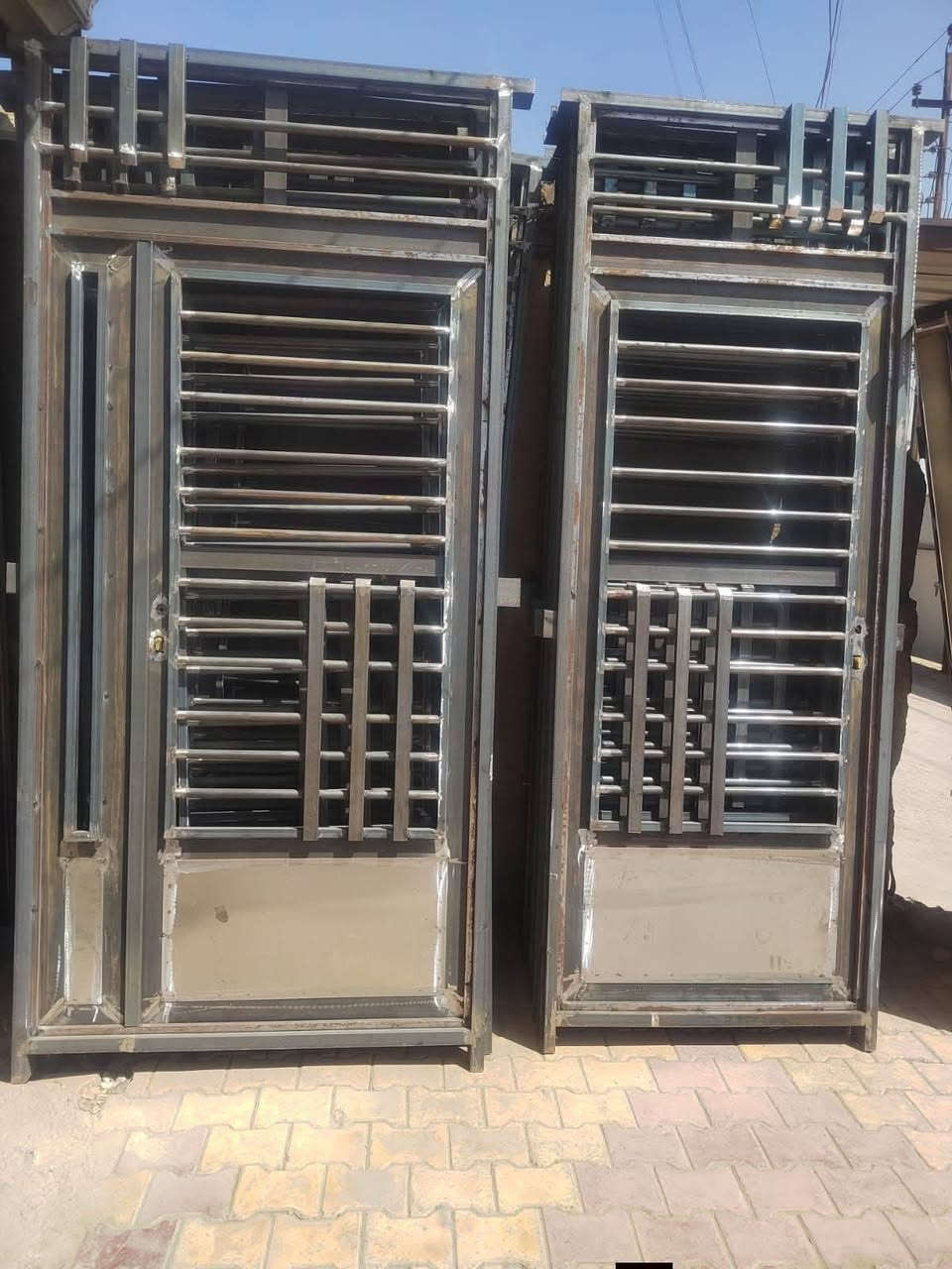 معمل حداد الرحمه بواب وشبابيك جملة فقط جنل ٣ مليم ونص  داخل مليم ونص شغل  درجه اولئ مكاني بغداد ***********
