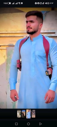 كلابية رجالية زرقاء اللون بتصميم أنيق ومريح. مثالية للمناسبات الرسمية ...