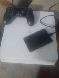 بلايستيشن 4 • هارد خارجي 500جيجا • مهكر