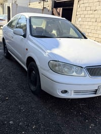 نيسان سني 2009 ياباني  بيه بارد بسيط بدون قطرة صبغ  للتواصل 0781008425...