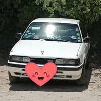 مازدا 323 • لوحة جديدة • سند جديد