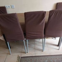 ميز طعام زجاج • أرجل حديد • دهوك زيرلاند