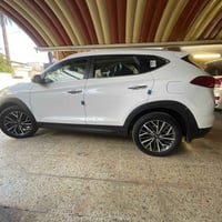 توكسان2020  كوري الاصلي شركه (الكاصد)ماشيه 100محرك2000 دوش    رقم  بغد...