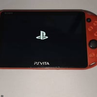 PS VITA 2000 • أحمر معدني • مهكر Enzo