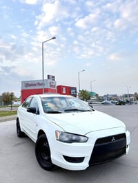 Lancer LX 2016  07518858007 TB:-براوەی دوبەیە مواسەفات(گێر تۆماتیک-ناو...