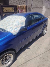 اوبترا موديل 2004 رقم الجديد گير عادي محرك وكير بحالة جيدة حدادية تمام...