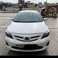 كورلا 2013 وارد أمريكي رقم بغداد  ابسمي تحويل ثاني يوم  تخم تاير جديد ...