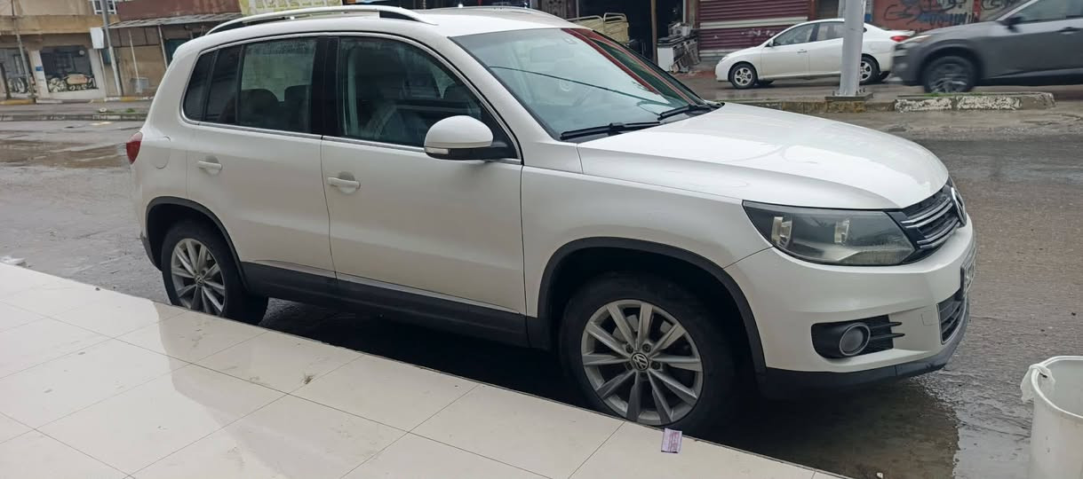 بەناوی خودا
تیگوان مۆدێل 2012
خلیجی
نیو دەرگای بۆیاغە
***********
