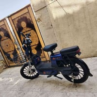 دراجة كهربائية • ٥ بطاريات • يشيل ٣٥ كيلو