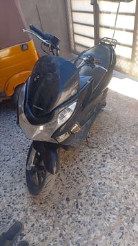 PCX • مدينه الصدر • ماسنجر