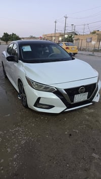 نيسان سنترا موديل :2021 SR رقم مثنى معوقين اللوان ابيض  سقف اسود بلادي...