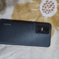 عندي ريلمي GT Neo 3 ذاكرة 256GB فقط ظهرة مفطور كامل مكمل وياه كارتونة ...