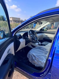 للبيع توسان موديل 2022رقم بغداد الجديد دولي بأسمي تحويل ثاني يوم  سيار...