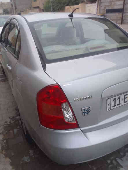 السلام عليكم اكسنت موديل ٢٠١١ خليجي رقم بغداد الجديد هزة جديدة سنوية لغايت ٢٠٣٠ رقم مميز بسمي السنوية شرط التحويل  سيارة بدون  أي ضربة أو طخة  بدون صبغ  
  سيارة بدون قطرة جراد  مكينة وكبر كفولات تبريد  ثلج  تخم تغير جديد حدادية جديدة   سيارة بدون اي نقص  أحله من الصور تجي وشوف  السعر ٩٧  مجال حك الجية   ويل عافية عل ياخذهة عنواني بغداد الدورة المهدية  مجاور الجسر *********** أو *********** واسف عل اطاله  تحياتي للجميع
