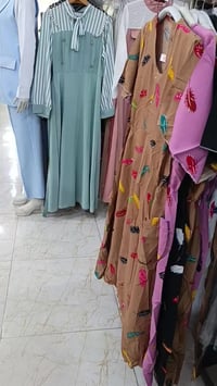 نجف الميلاد • ملابس نسائية • ملابس أطفال