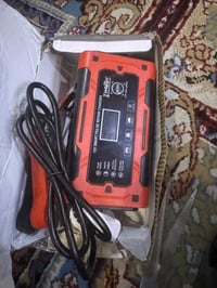 شاحن بطارية • ١٢ فولت • كامل