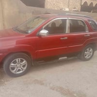 عندي سبورتج 2010 وارد امريكي مكينه 2500 باسمي 07700994177