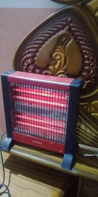 هيتر 4شمعات 15ويه التوصيل 07725829478