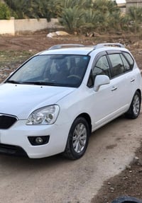 كيا كارنز 2012 رقم بغداد الدولي باسمي السياره جاهزه  مكينه وكير خير من...