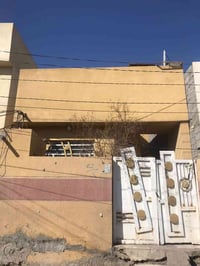 كربلاء حي العسكري • ١١٠م • واجهة ٥ ونص