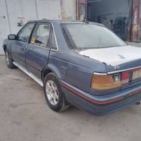 مازدا • ١٩٩١ • كويسينجاك