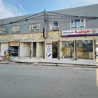 عمارة تجارية • حي الملايين الأولى • ٢١٠م