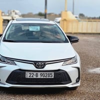 كورلا ساز موديل 2024  ماشية52 الف السيارة جديدة مكفولة من الصبغ والفتح...