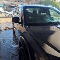 دوج جورني 2014 للبيع المحرك 4سلندر 2400 اللون رمادي عنوان السيارة بغدا...