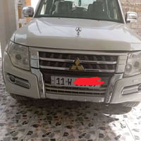 ميتسوبيشي باجيرو 2015 حبتور  رقم بغداد جديد  فل مواصفات  تخم تايرات جي...