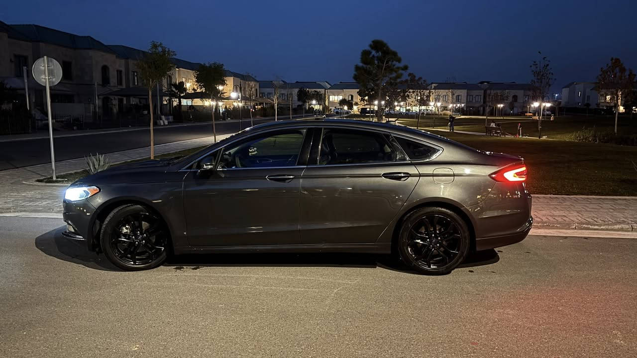 � فورد فيوجن 2018 – SE
📄 كلين تايتل

🔧 المحرك والقير

 • محرك 1.5 EcoBoost توربو

 • ناقل حركة أوتوماتيك

 • دفع أمامي

 • اقتصادي ونشيط جداً

✨ مواصفات SE

 • كشنات جلد

 • تدفئة كشنات

 • خزن ميموري لمقعد السائق

 • فتحة سقف

 • تشغيل عن بُعد

 • Apple CarPlay / Android Auto

 • مثبّت سرعه (Cruise Control)

 • شاشة وسطية

 • كاميرا خلفية + حساسات رجوع

 • دخول ذكي + بصمة تشغيل (إذا موجودة)

 • بلوتوث + USB + AUX

 • مقود متعدد الأزرار

🛡️ أمان وتقنيات

 • Airbags كاملة

 • ABS + Traction Control

 • إضاءة LED نهارية

 • Hill Assist

📌 حالة السيارة

 • صيانة دورية

 • محرك وكير بحالة ممتازة

 • استخدام نظيف بدون مشاكل

سعر: 117$

📍 أربيل

📞 للاستفسار

***********
