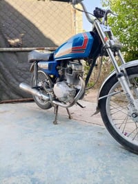 سي جي ١٢٥ • نامه امتياز • مكينه ٢٣