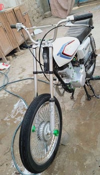 درّاجة 400 • بيع أوراق • معها مجال