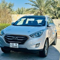 توسان 2012 وارد امريكي بيها قطعتين صبغ جاملق و باب   مكينه و كير كفاله...