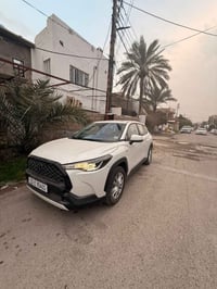 كورلا كروز هايبرد وبنزين موديل ٢٠٢٥ سياره زيرو صفر ماماشيه رقم بغداد م...