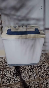 غسالة نظيفة • تشتغل • النجف