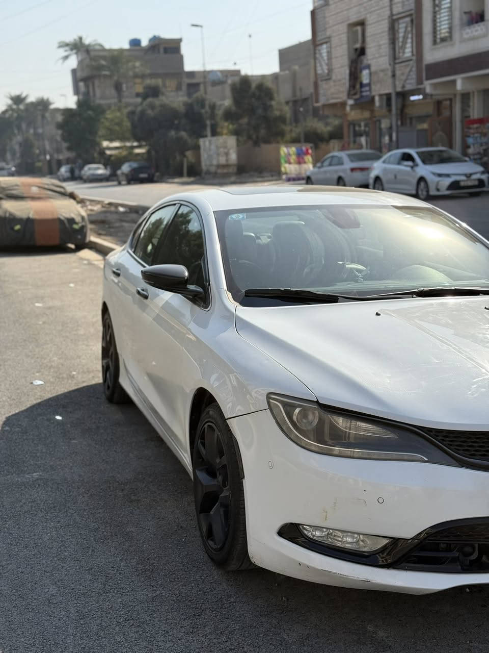 سلام عليكم كرايسلر 200 محرك 3600cc بلاتين يوم فول موصفات 2015 .موصفات السيارت
1.بريك ذاتي خلفي و امامي
2.قياده ذاتيه وصتفاف ذاتي
3.تبريد تدفئة في الكشن و تدفئة في الستيرن
4كشنات كهرباء معا ميموري حفض وضعيات الكشن
5.سقف بنو رامة 
6.شاشة كبيرت 
7.تشغيل عن بعد و ترحيب عند تقرب من السيارة 
8.السيارت دفع كلي فور ويل 
9.كزوز رياضي 
10.تبريد قطعتين معا مناخ منفصل 
السيارت بيهى كومة موصفات يطول شرحه محرك جديد قبل شهرين مبدل من الحاويت جديد بل باكيت حداث السيارت جاملغ المامي  جيهة السايق مطخوخ او الخلفي هم  صورت الحادث بل منشور  بيهى صبغ صفحة السايق على اثر حادث مريكة وهنا بل عراق بس باب لي بصف السيق مصبوغ نوقص السيارت يراد حساس واحد امامي فقط السعر (124ورقة )وبيهى مجال بسيط العنوان بغداد شارع فلسطين رقم الهاتف ***********
