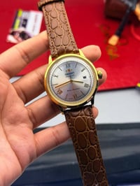 مكينة ع النبض • بدون باتري • جلد طبيعي